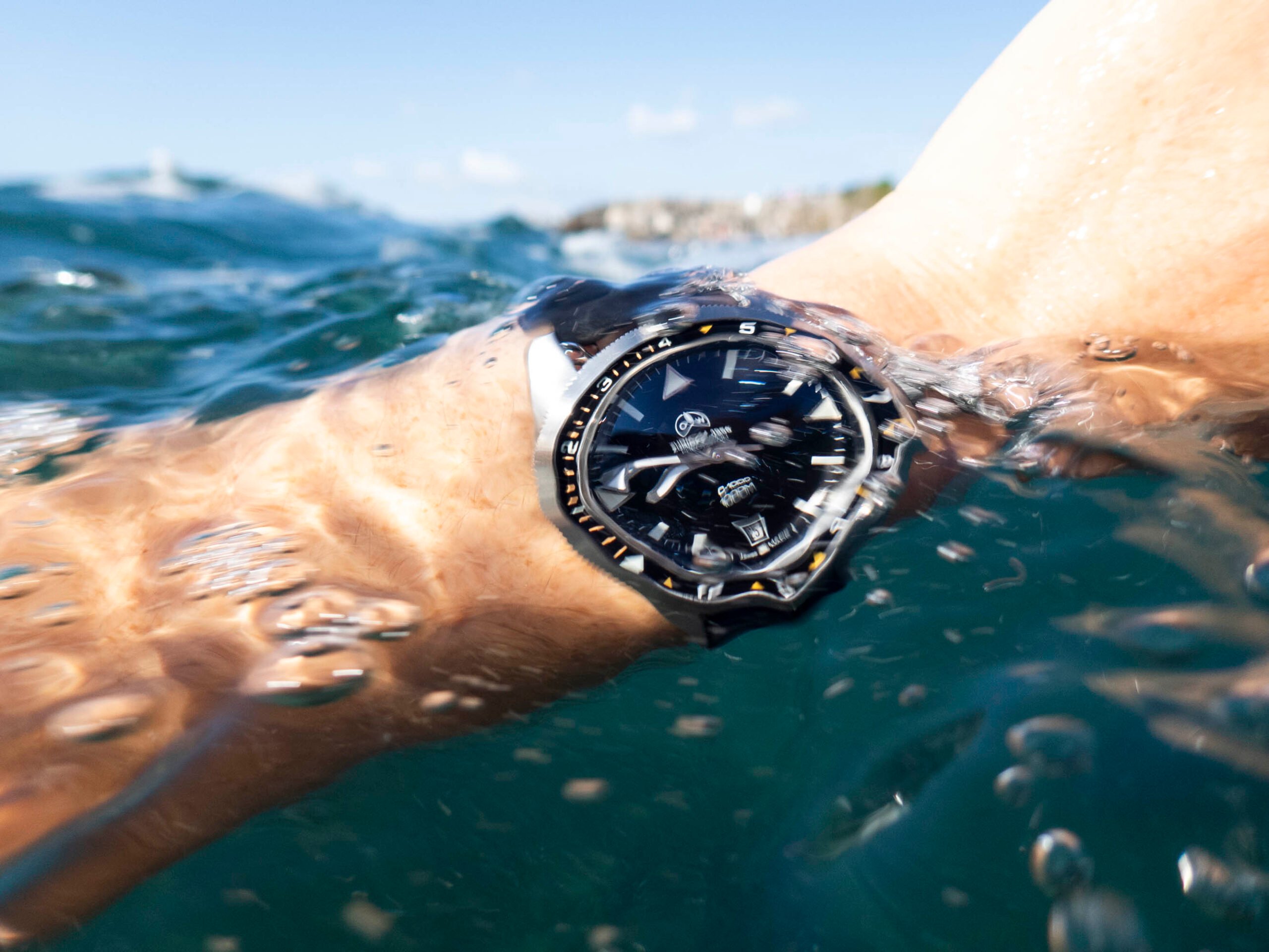 Ollech & Wajs C-1000 Wrist shot coming out of the water