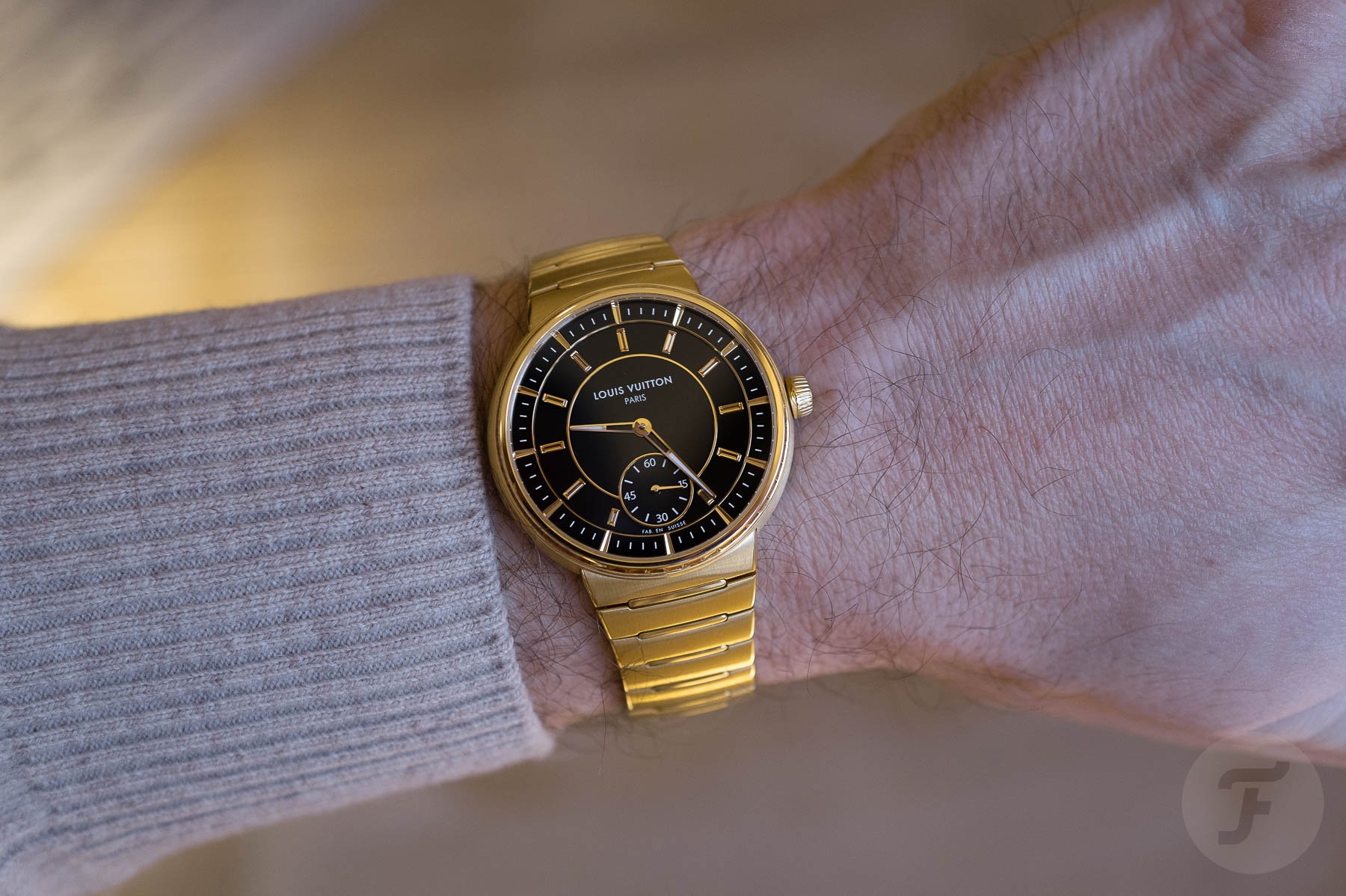 Louis Vuitton Tambour Yellow Gold Onyx wrist shot header image