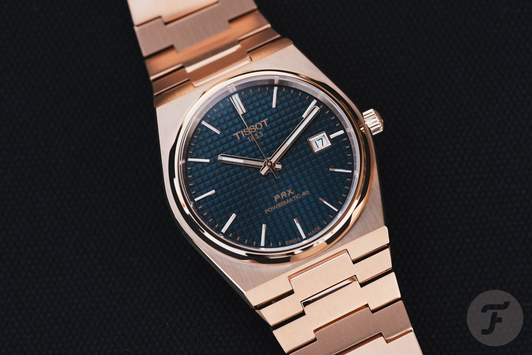 Tissot PRX Powermatic 80 40mm in rose gold and blue, flat